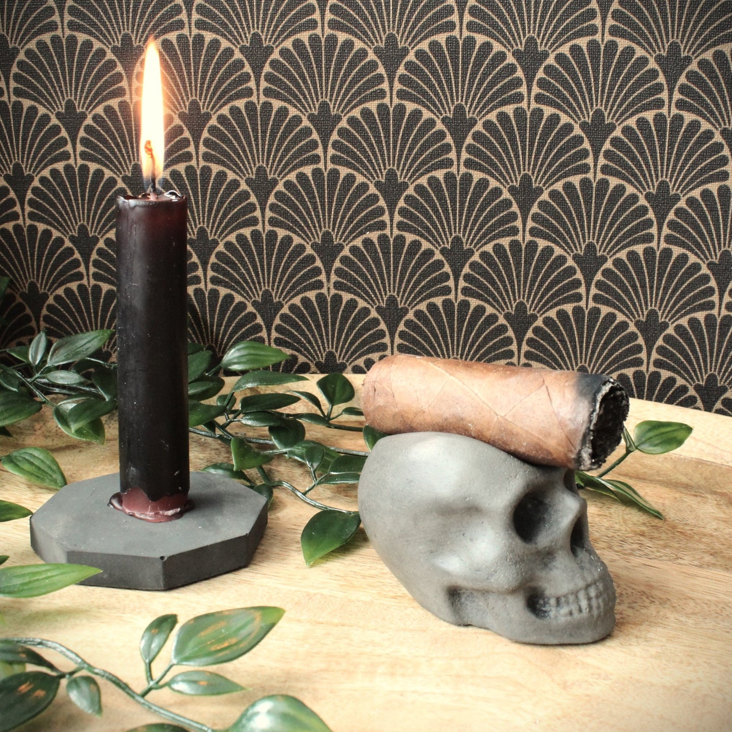 closeup of rustic luxury skull cigar holder cast in stone