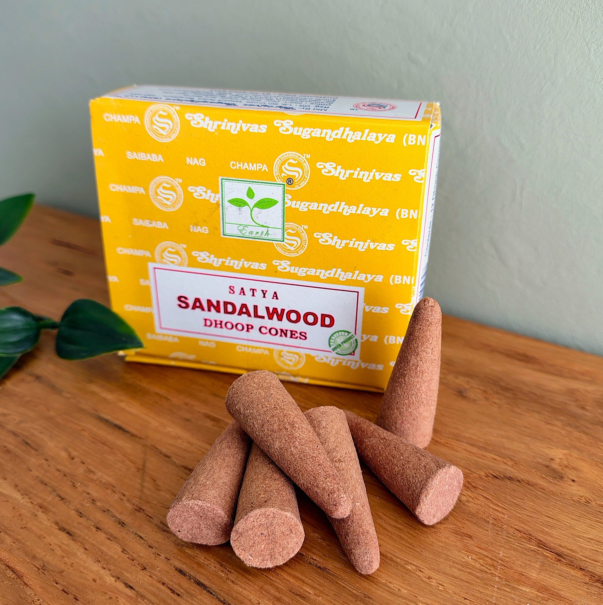 Close-up of Satya Sandalwood Dhoop Cones stacked together with box in background